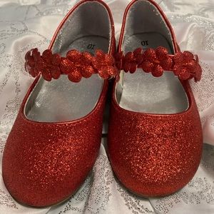 Red sparkle shoes size 10.